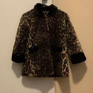 I am selling a coat. It is leopard printed. And the brand is copper key.